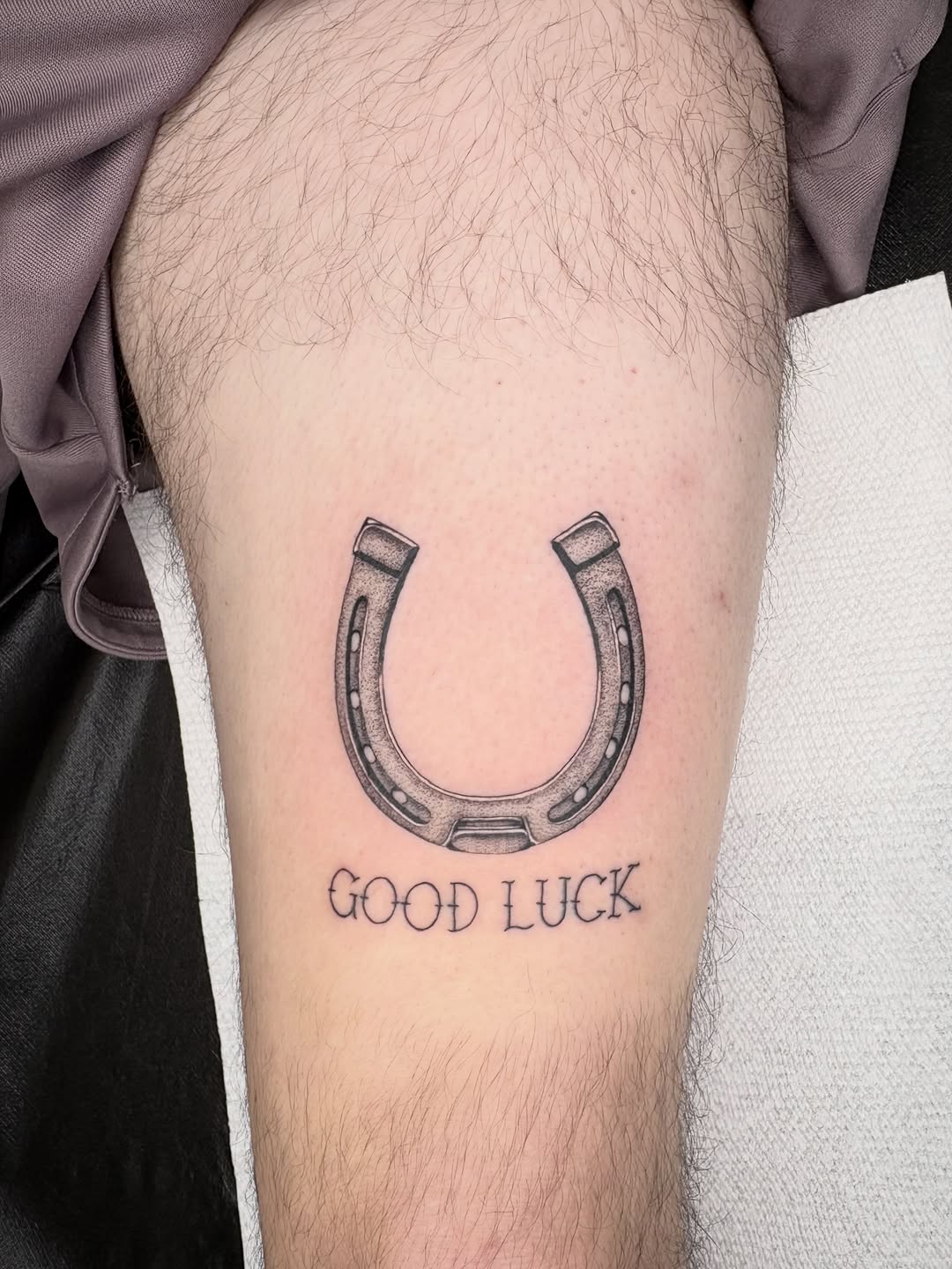 Tattoo by @totally.tattoo — black_and_grey, lettering_script