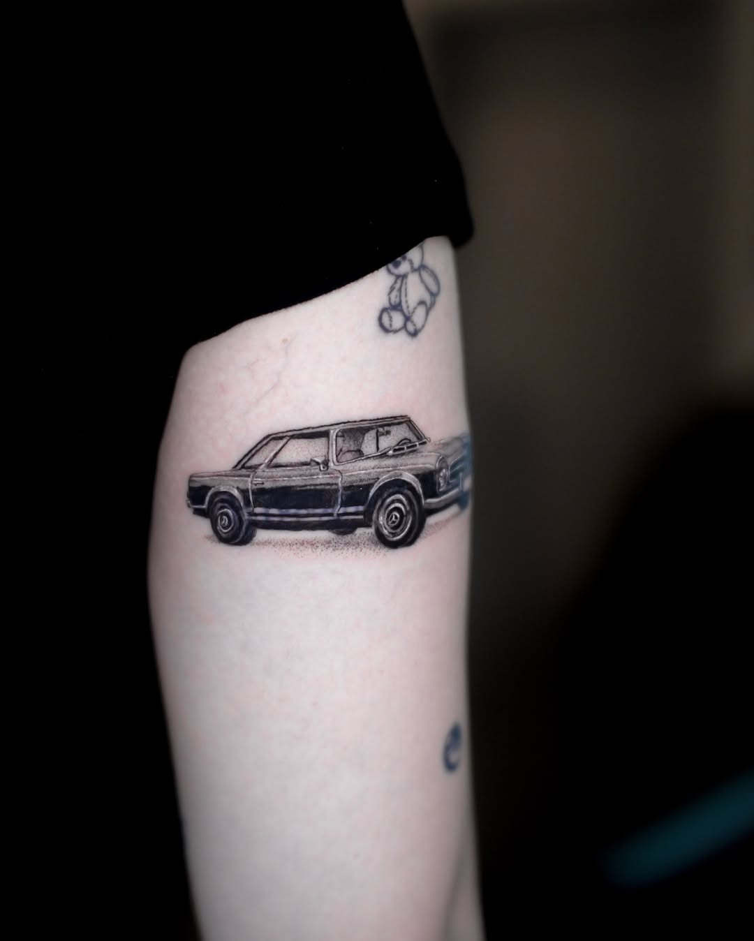 Tattoo by @minto.tattoo โ realism, black_and_grey
