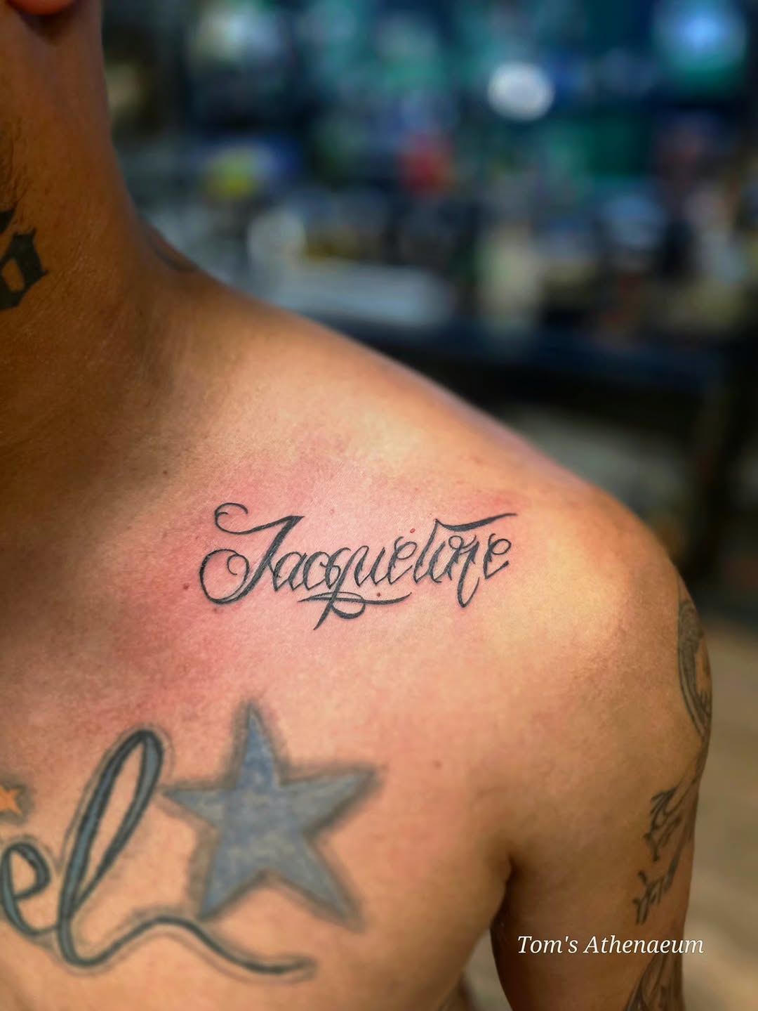 Tattoo by @toms_athenaeum — lettering_script, fine_line