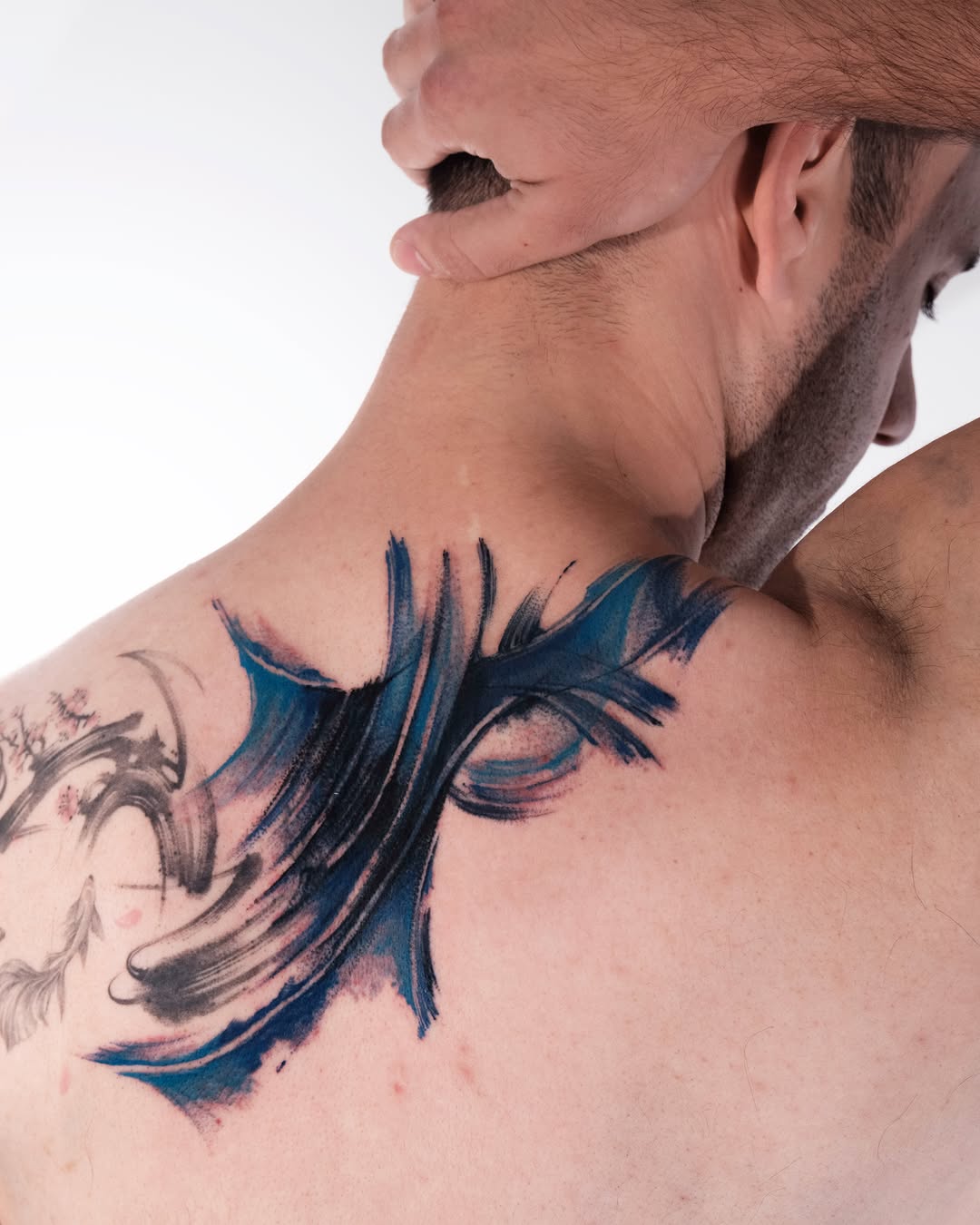 Tattoo by @melange.tattoo — watercolor, blackwork