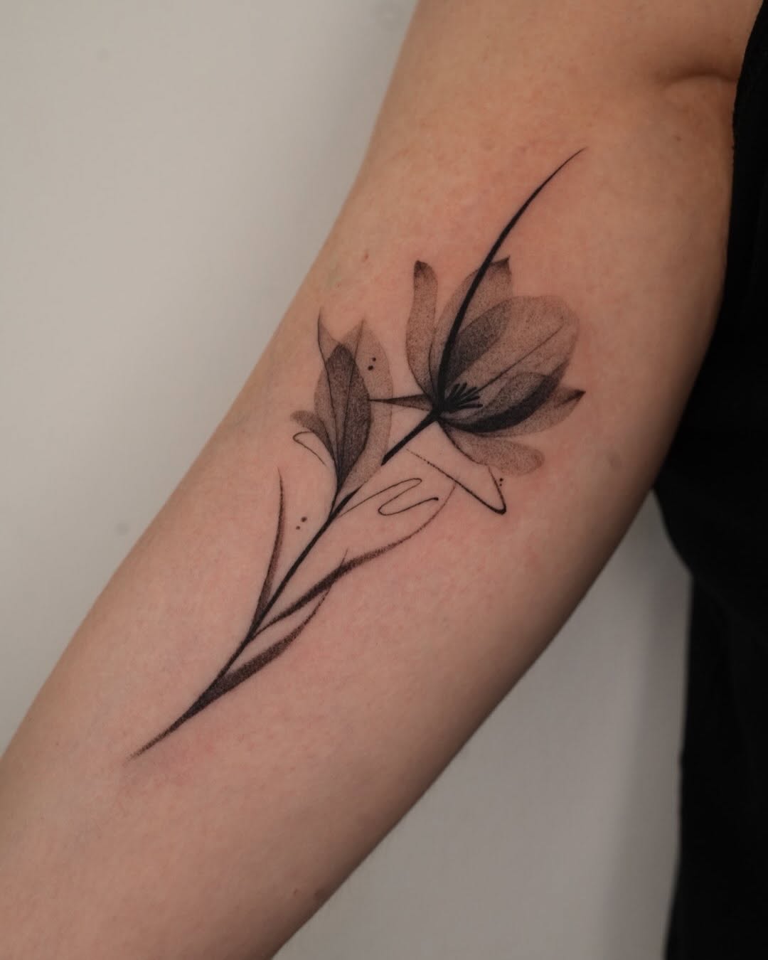 Tattoo by @tattooer_r.tee — fine_line, black_and_grey