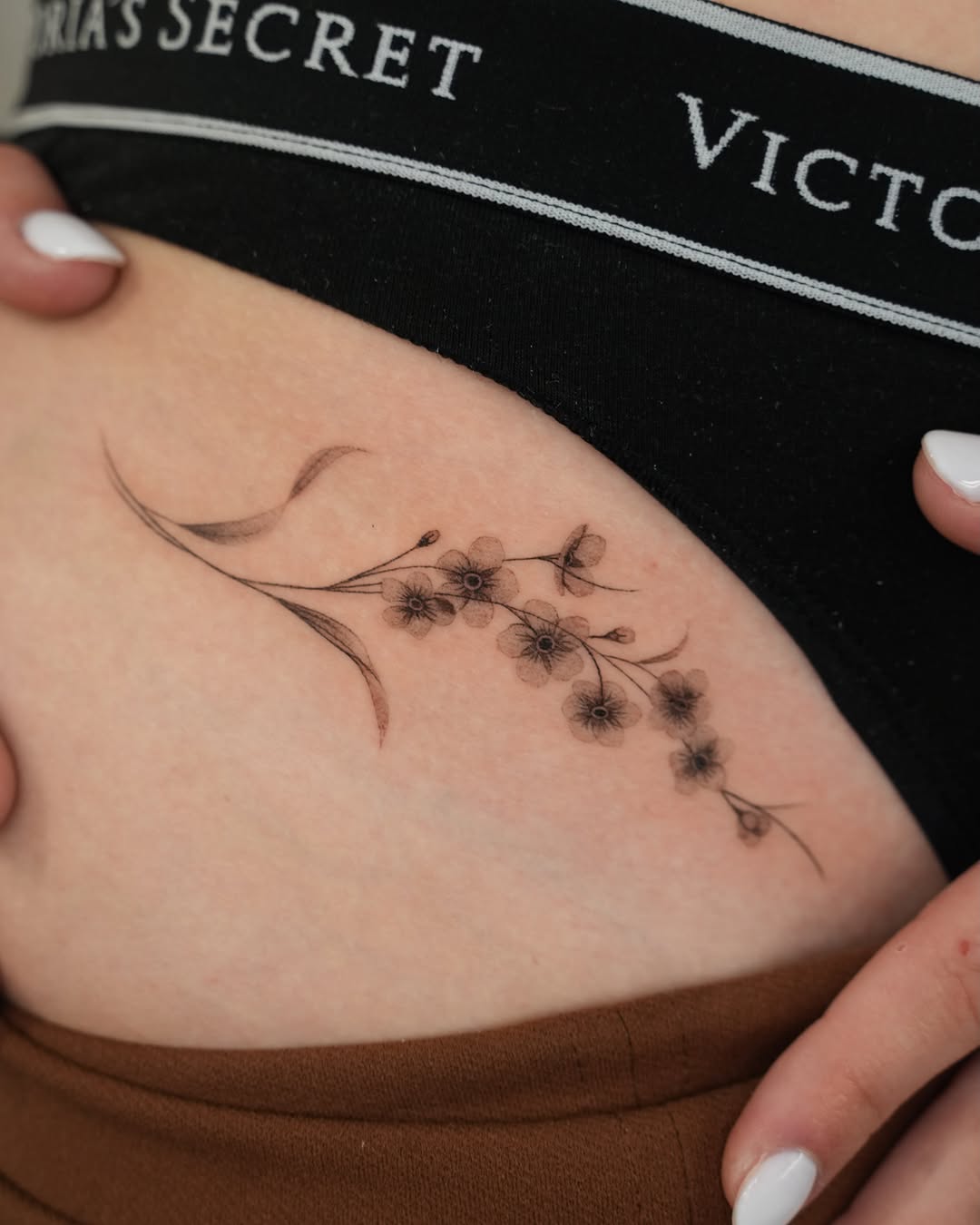 Tattoo by @tattooer_r.tee — fine_line, black_and_grey