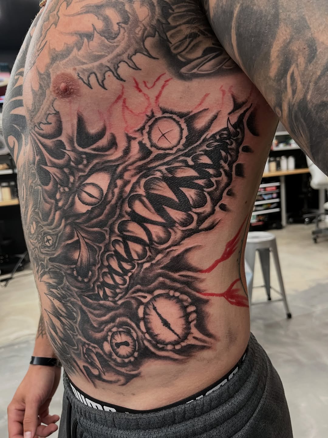 Tattoo by @ghost_world_studios — black_and_grey, dark_realism