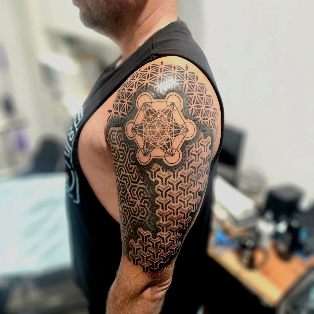 Tattoo by @tatsbykyra1 — geometric, dotwork