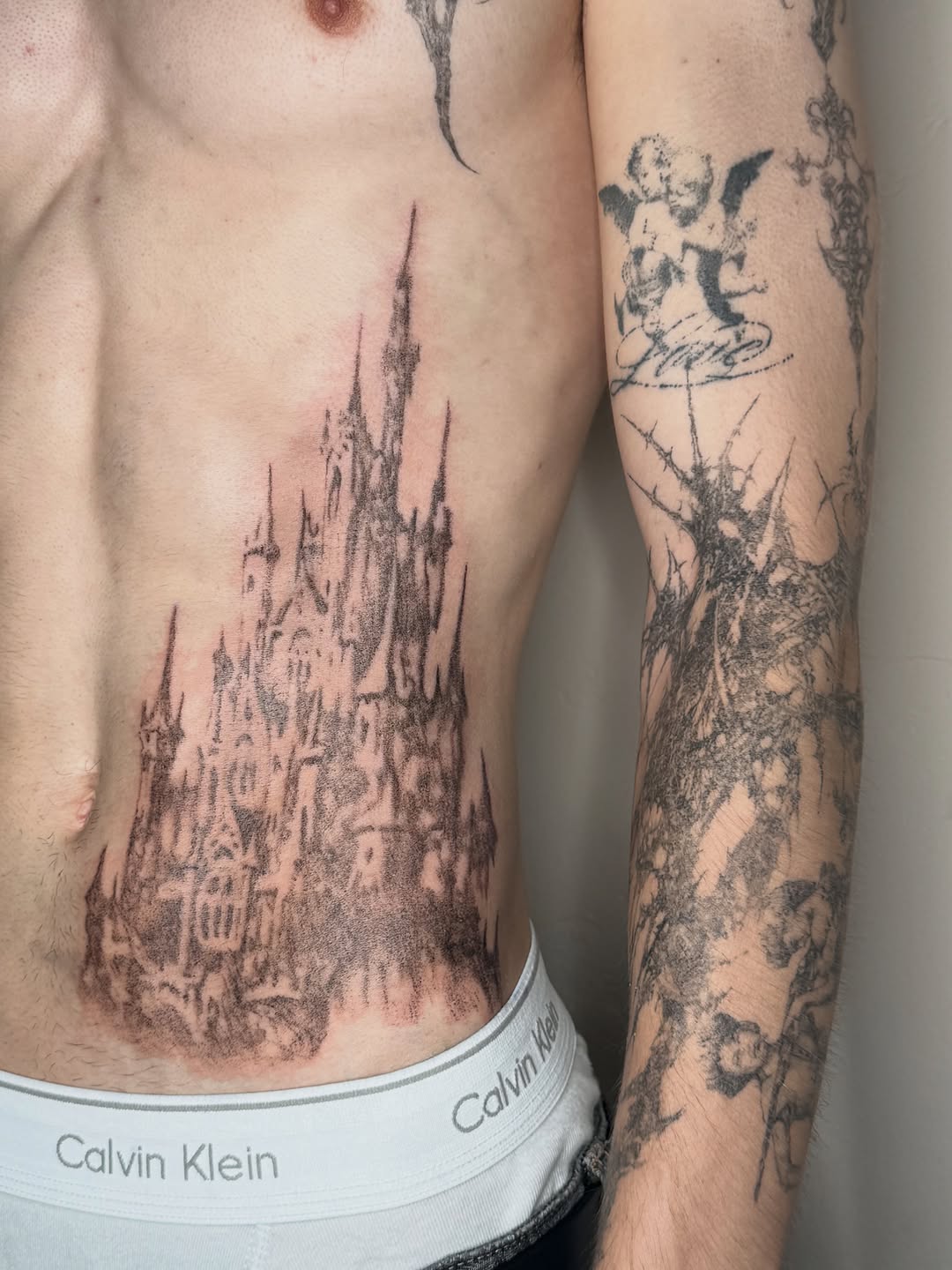 Tattoo by @seren.tatts — black_and_grey, dark_realism
