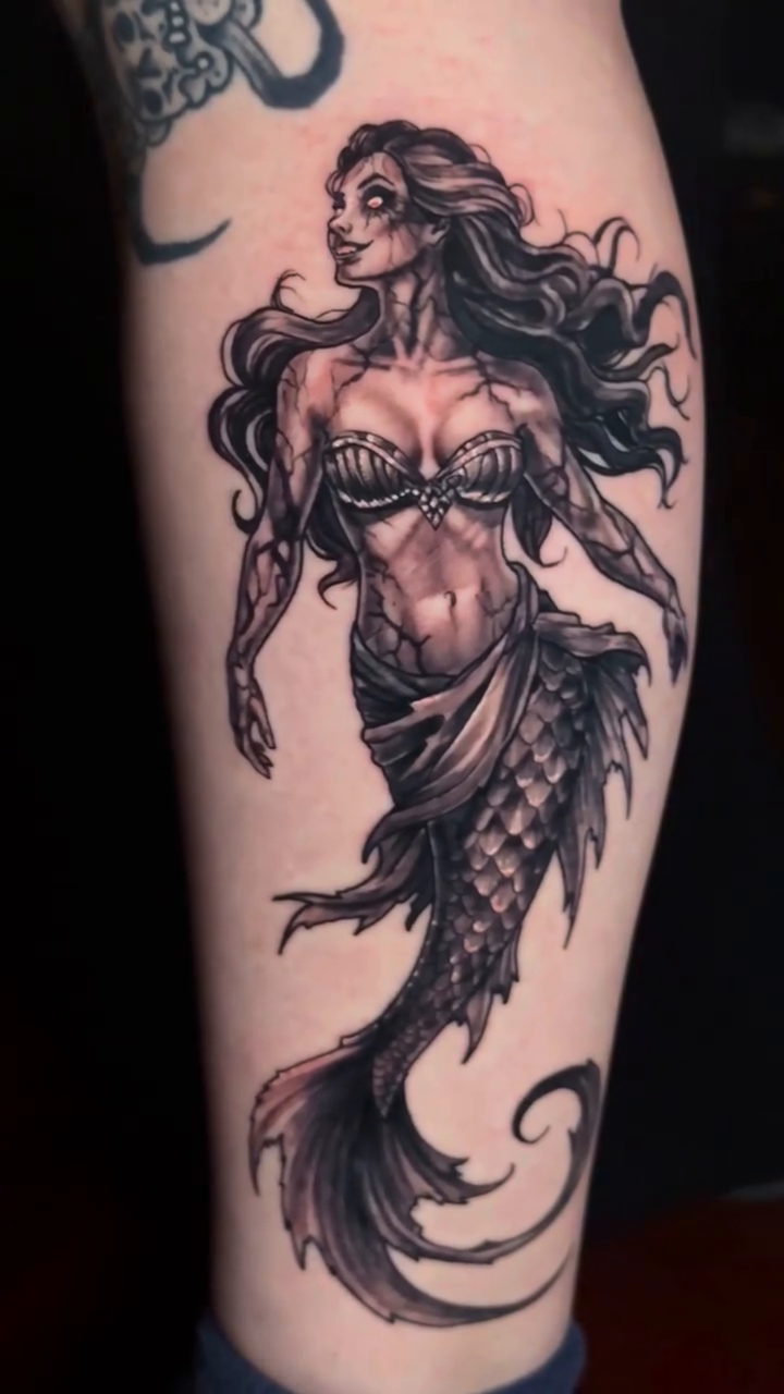 Tattoo by @tonywhodoestattoos — black_and_grey, realism