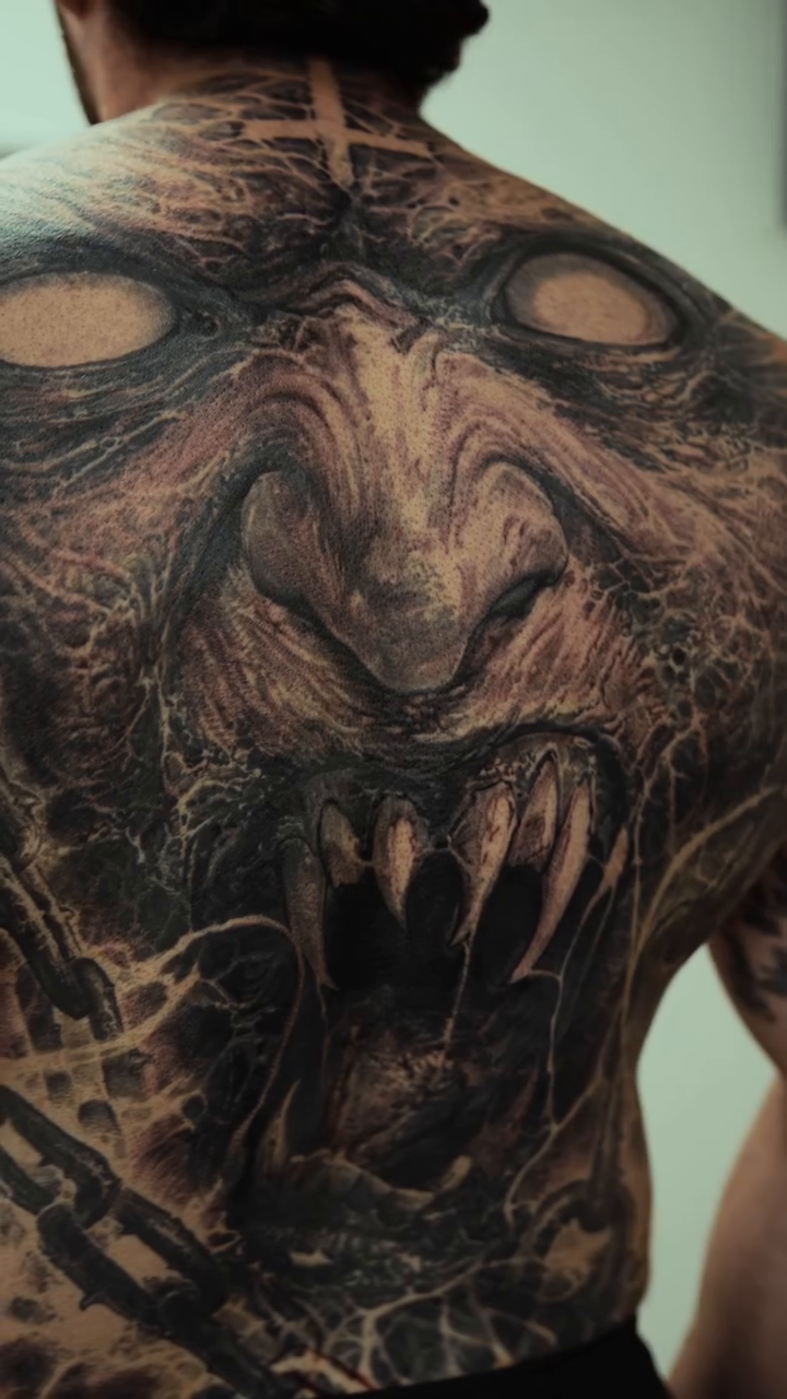 Tattoo by @robbylatos — dark_realism, black_and_grey