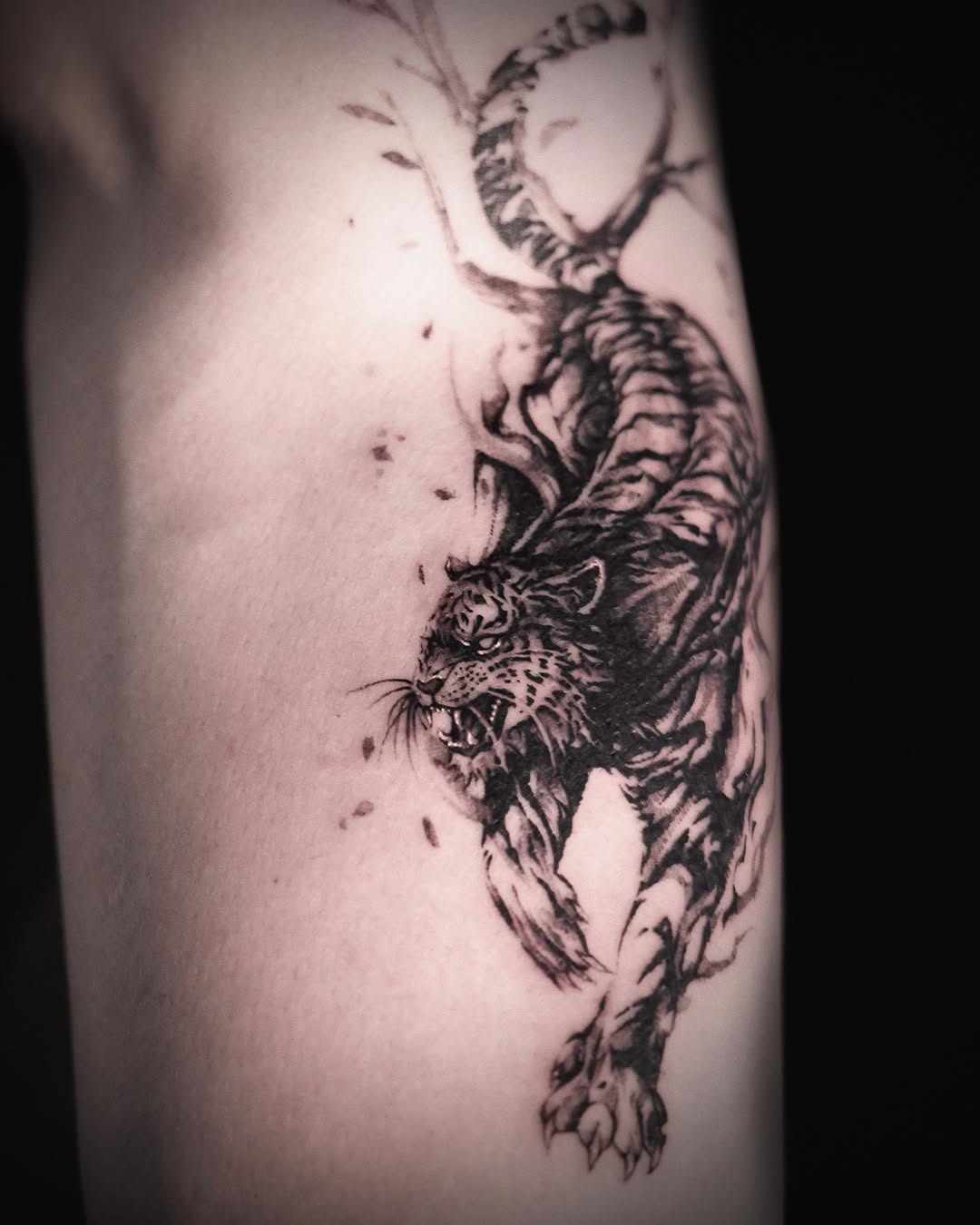 Tattoo by @dowoo_tattoo β realism, black_and_grey