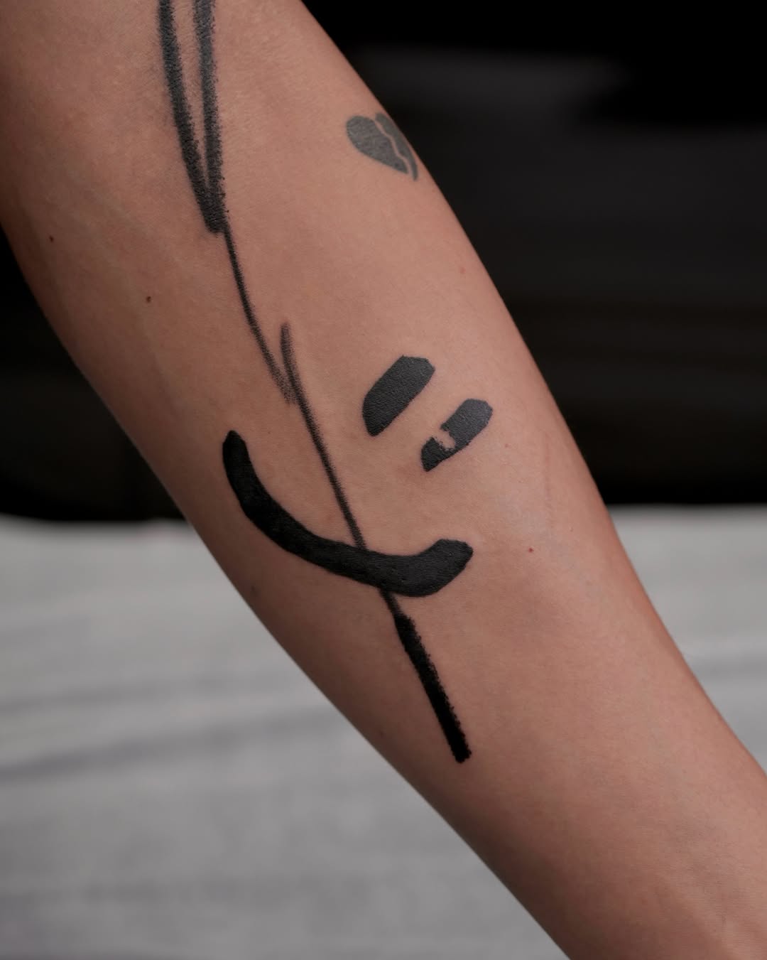 Tattoo by @m.tattooist.iv — blackwork, minimalist