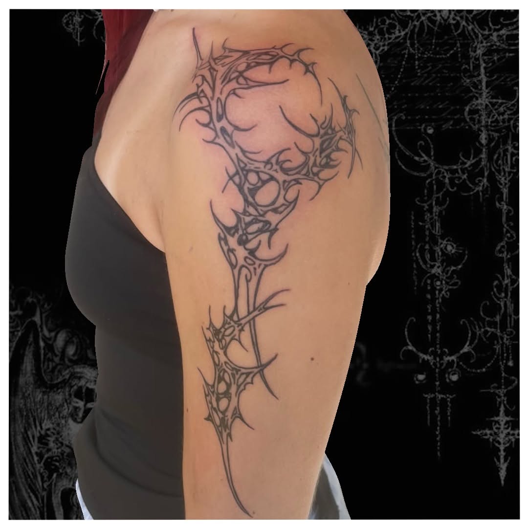 Tattoo by @cxt.ink — blackwork, ornamental