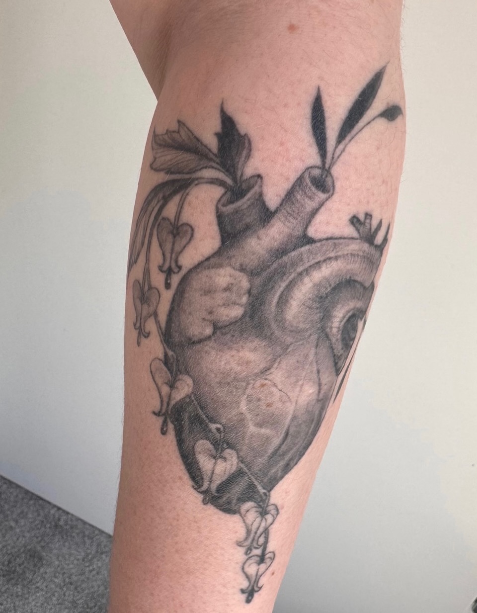 Tattoo by @katelynbraun.art — realism, black_and_grey