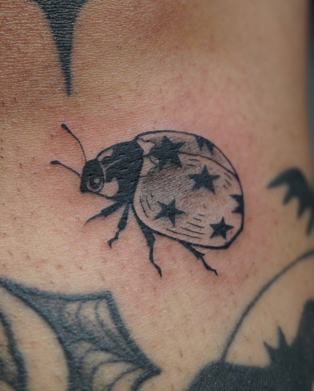 Tattoo by @scaredy.cat.tatts — black_and_grey, illustrative