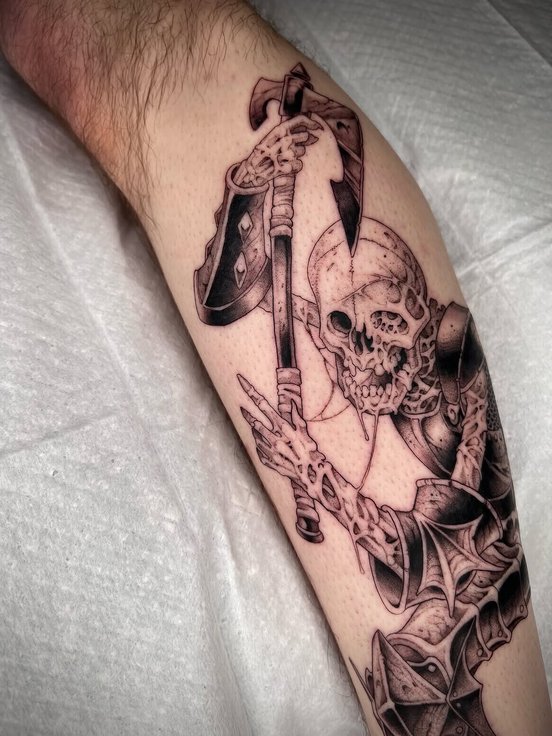 Tattoo by @revoltingworship — dark_realism, black_and_grey