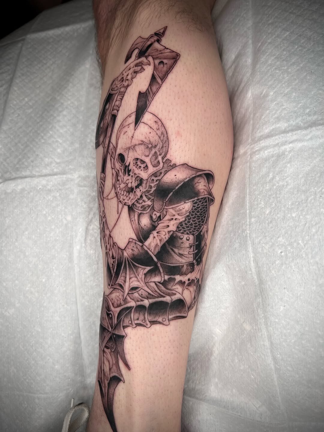 Tattoo by @revoltingworship — dark_realism, black_and_grey