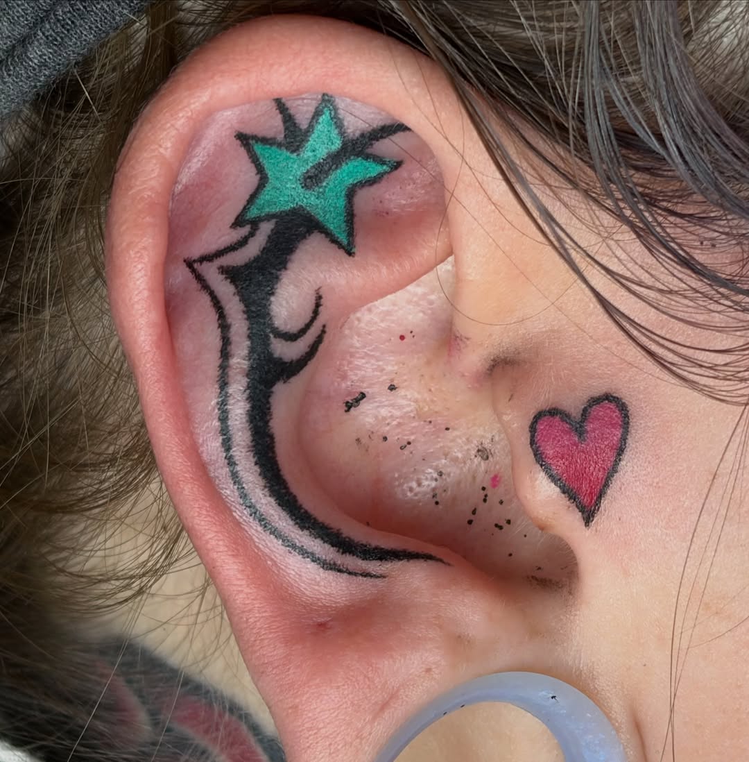 Tattoo by @caitberries — blackwork, minimalist