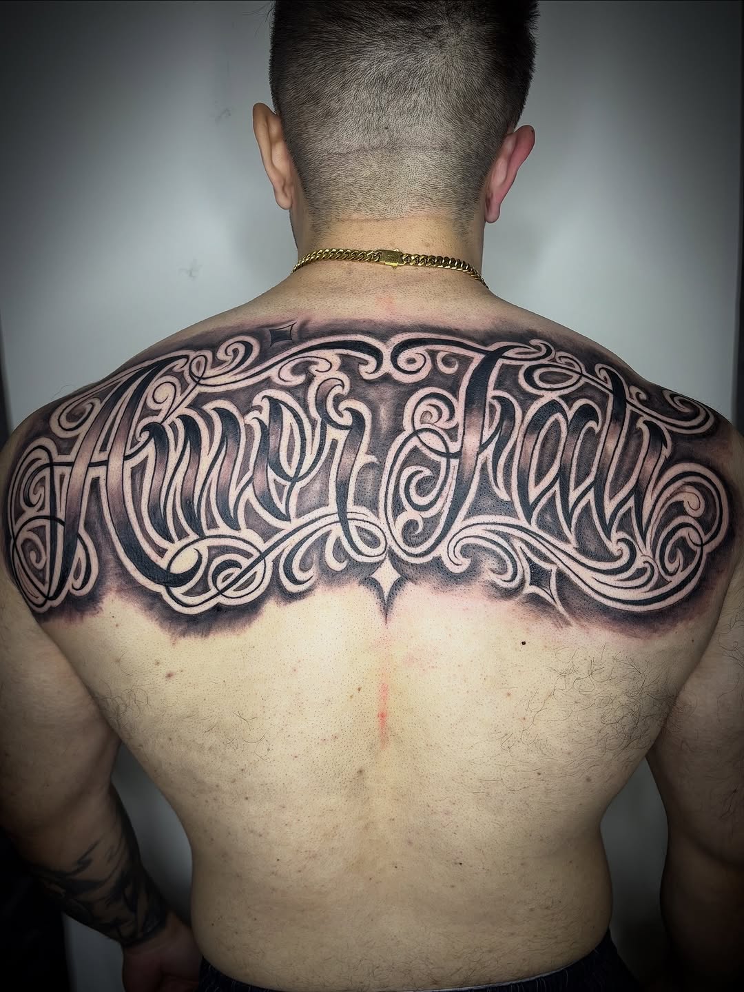 Tattoo by @zhentats2 — lettering_script, blackwork