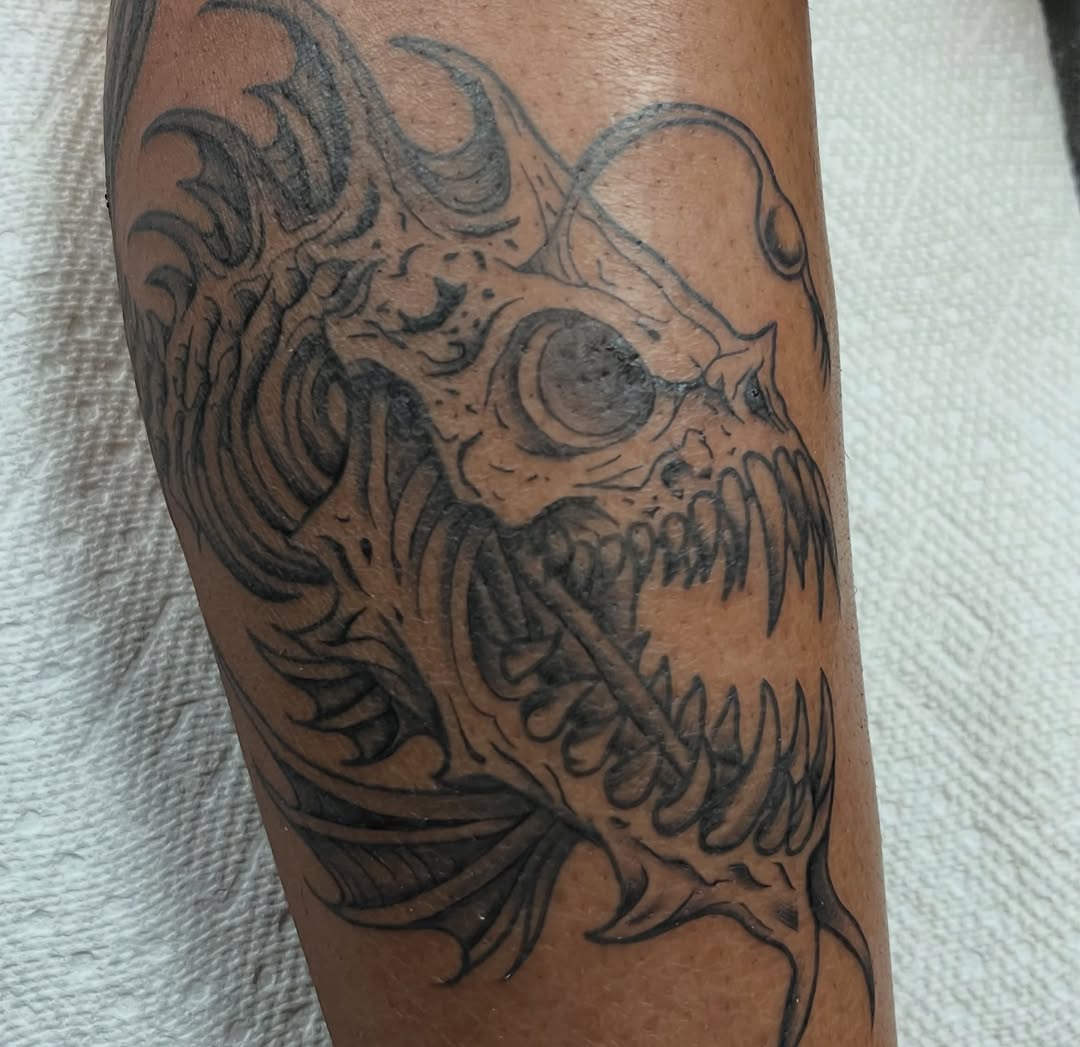 Tattoo by @mischiefinkparlor18 — black_and_grey, dark_realism