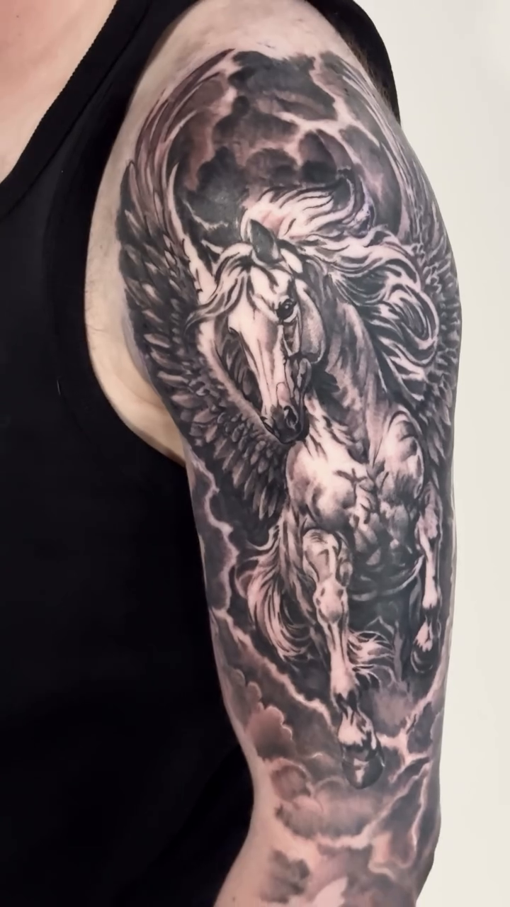 Tattoo by @robdansontattoo — realism, black_and_grey