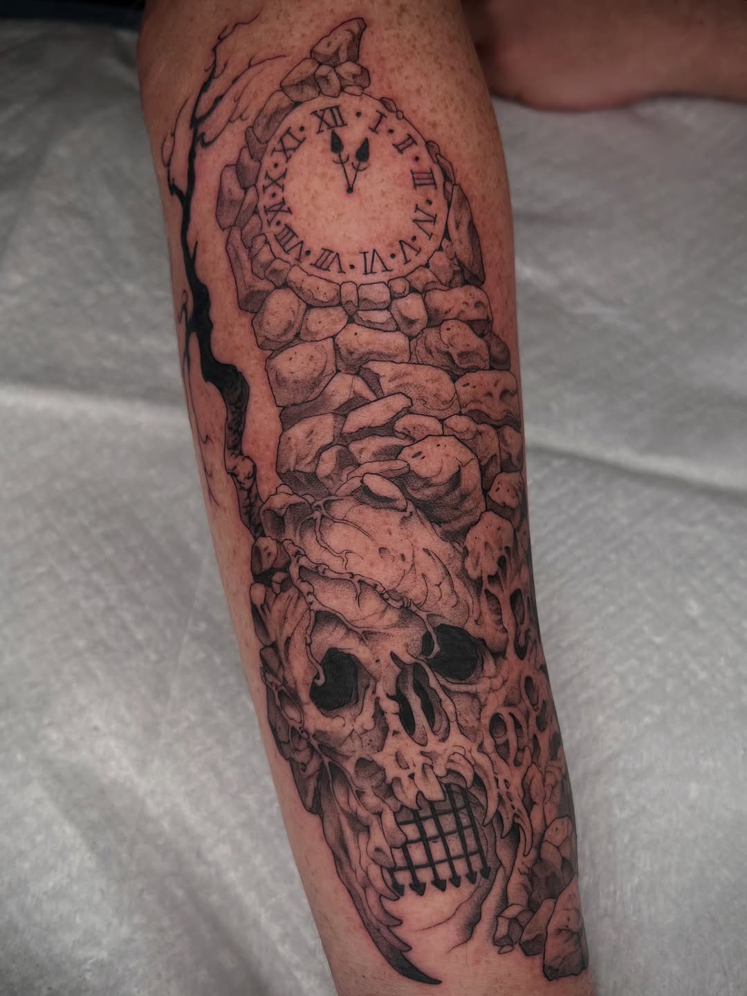 Tattoo by @revoltingworship — black_and_grey, realism