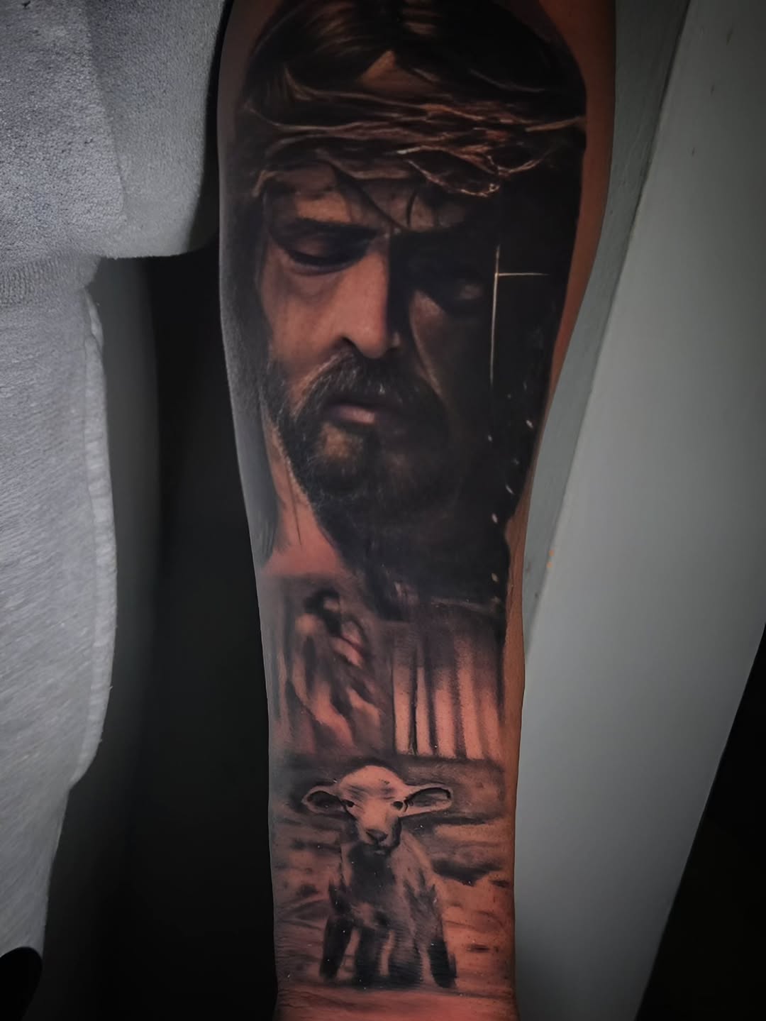 Tattoo by @goth_ross_502 — realism, black_and_grey