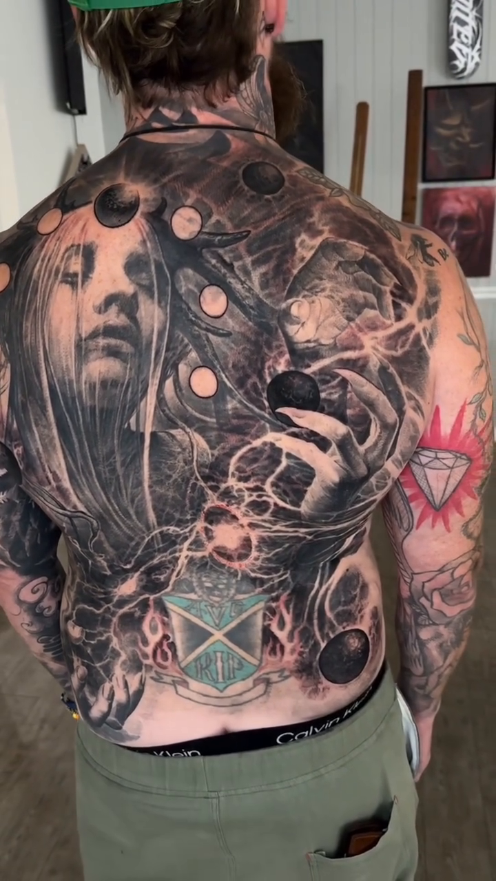 Tattoo by @robbylatos — dark_realism, black_and_grey