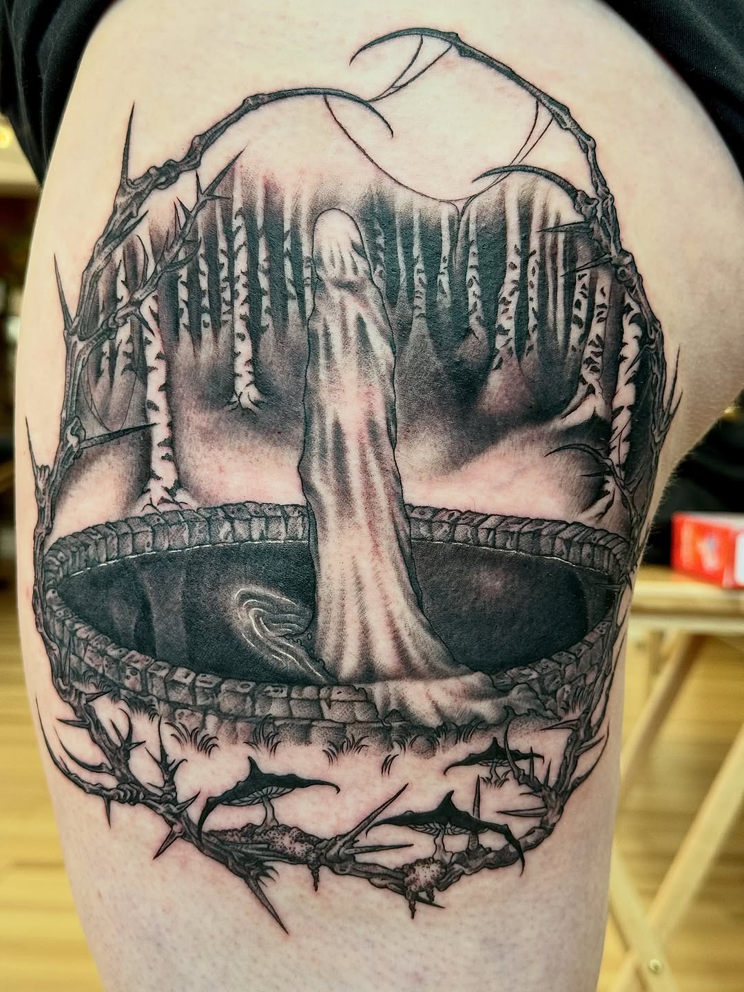 Tattoo by @amberbananafish — dark_realism, black_and_grey