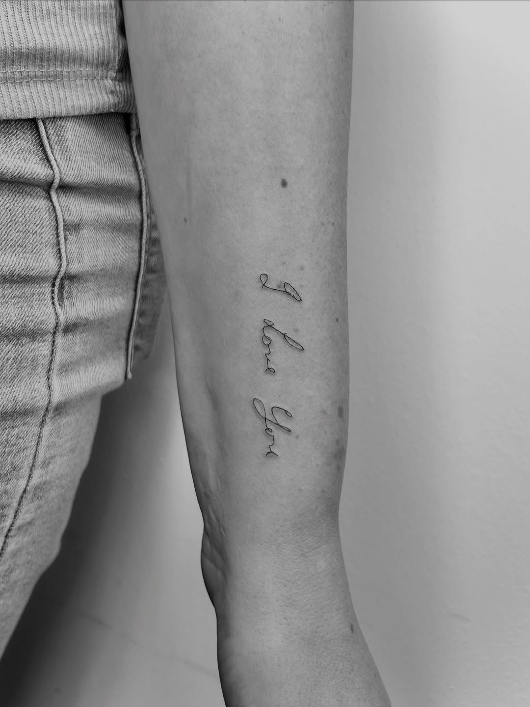 Tattoo by @elliemay.tatts โ lettering_script, fine_line