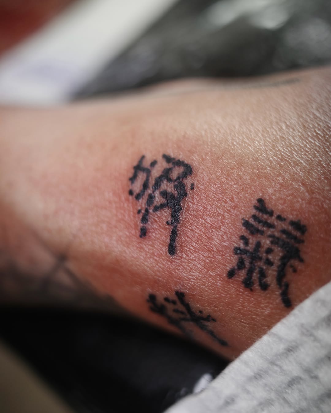 Tattoo by @takuu_tattoo — lettering_script