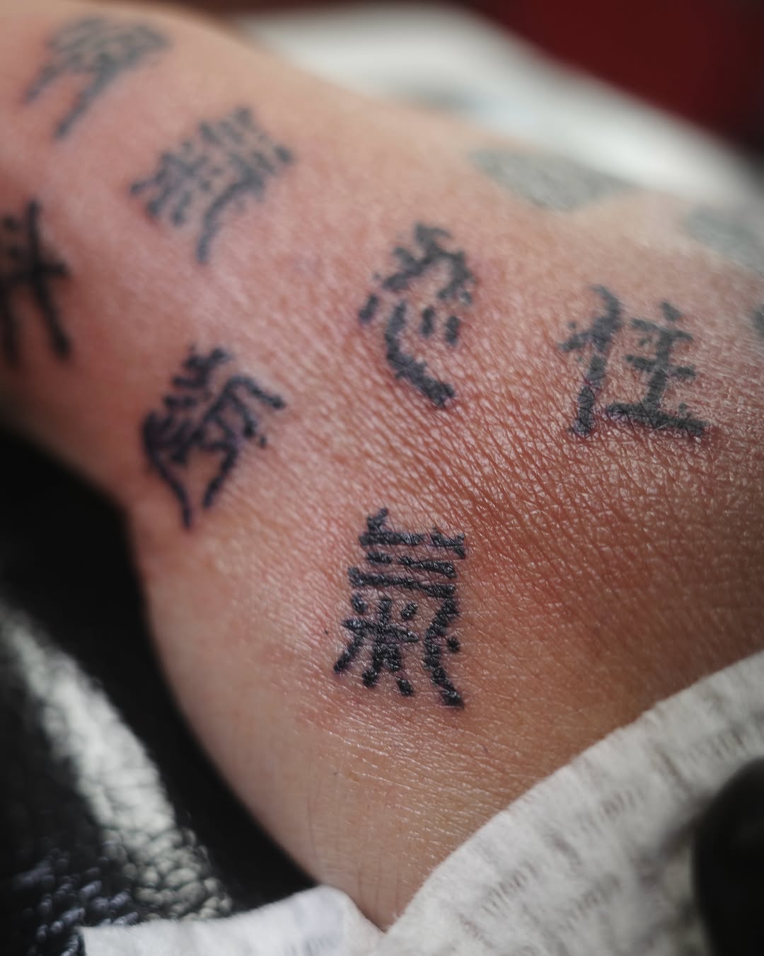 Tattoo by @takuu_tattoo — lettering_script