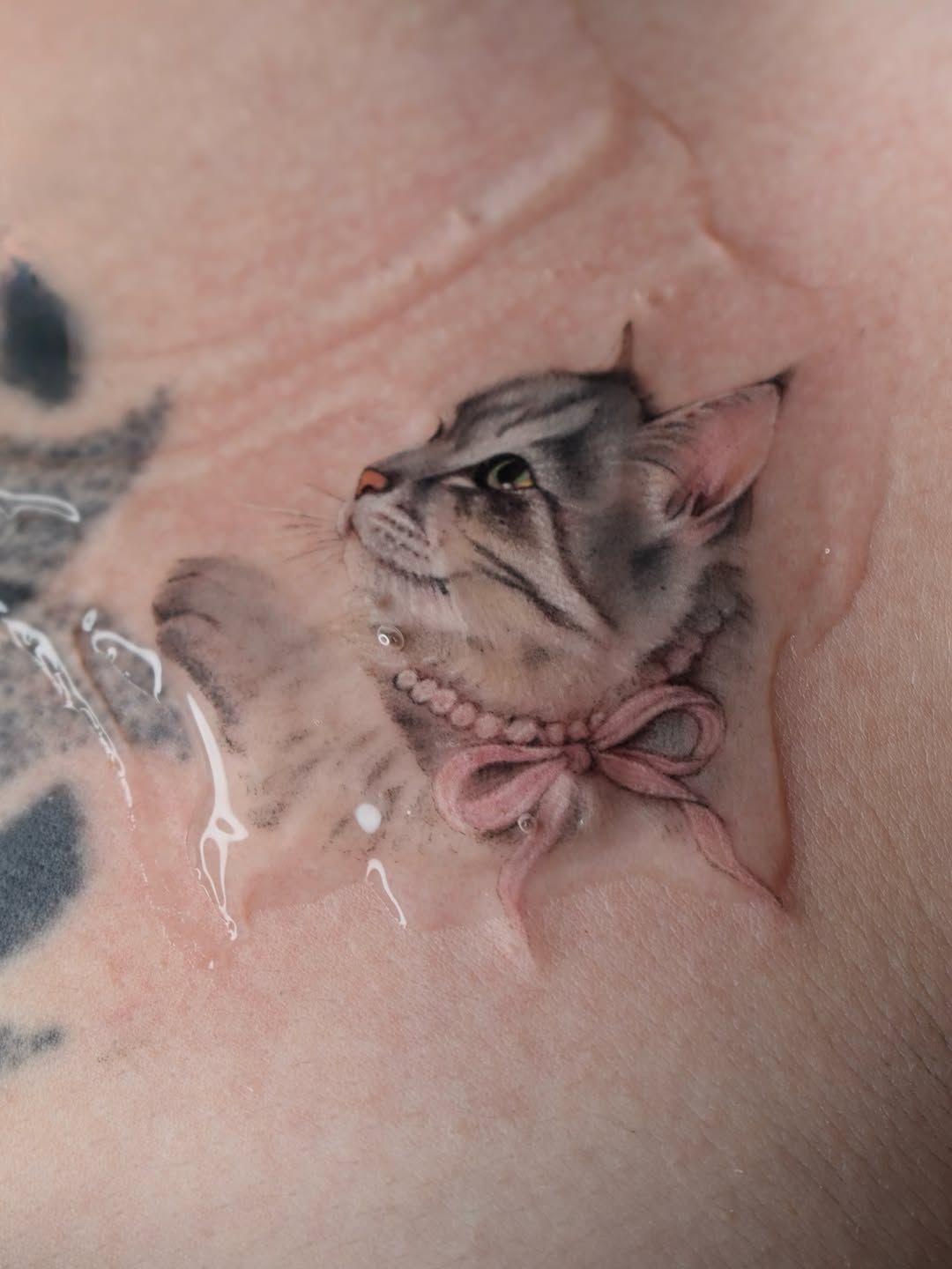 Tattoo by @biyanova_microrealism_tattoo — realism, fine_line