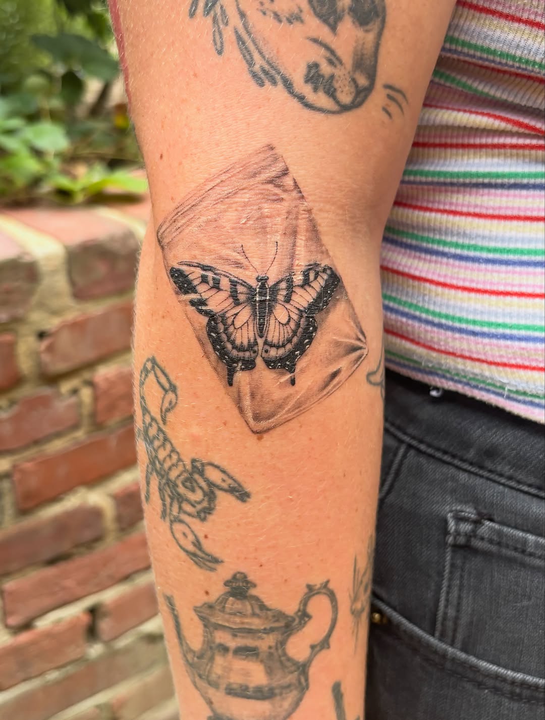 Tattoo by @jaded.artxx — realism, black_and_grey