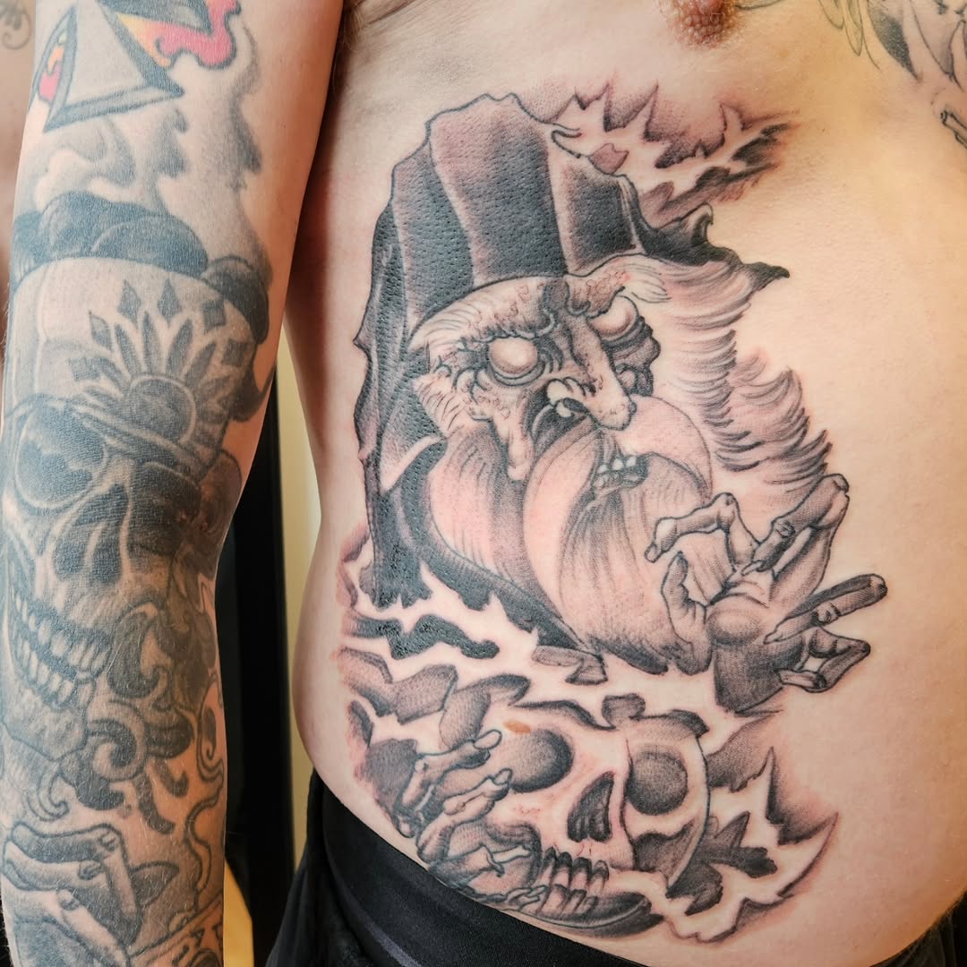 Tattoo by @jasonpellandtattoo — dark_realism, black_and_grey