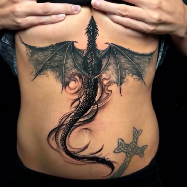 Tattoo by @calebwhitetattoos — black_and_grey, realism