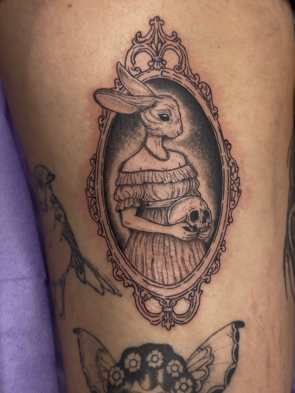 Tattoo by @feralfawntattoo — dark_realism, black_and_grey