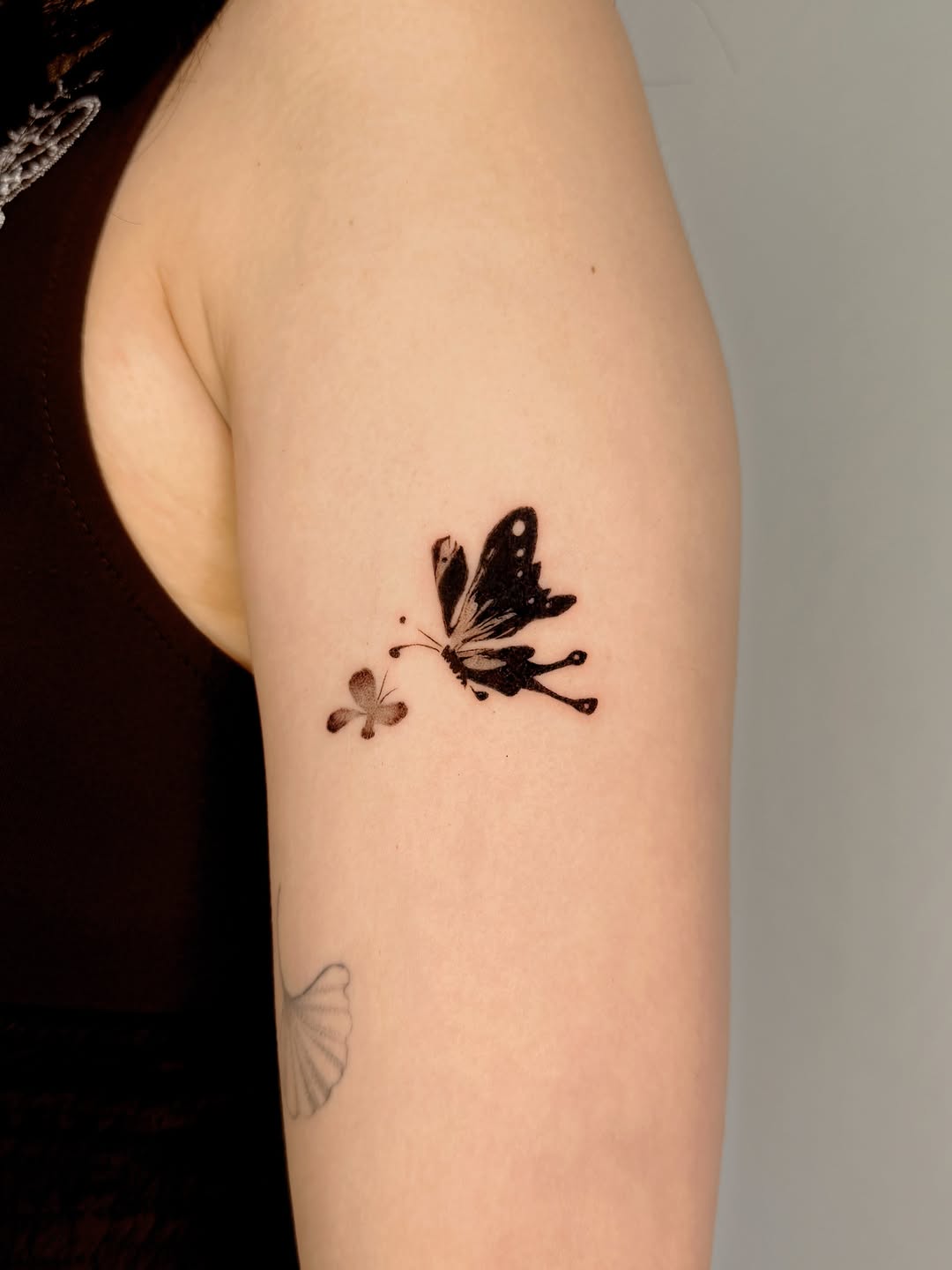 Tattoo by @shanyi.tats — fine_line, black_and_grey