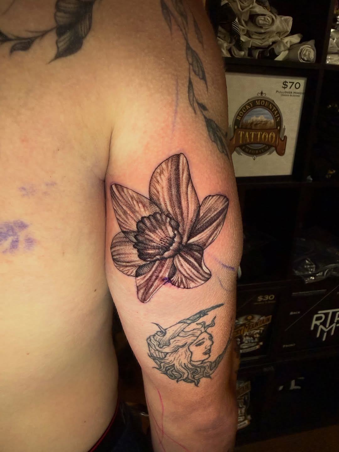 Tattoo by @rosie.tattoo — realism, black_and_grey