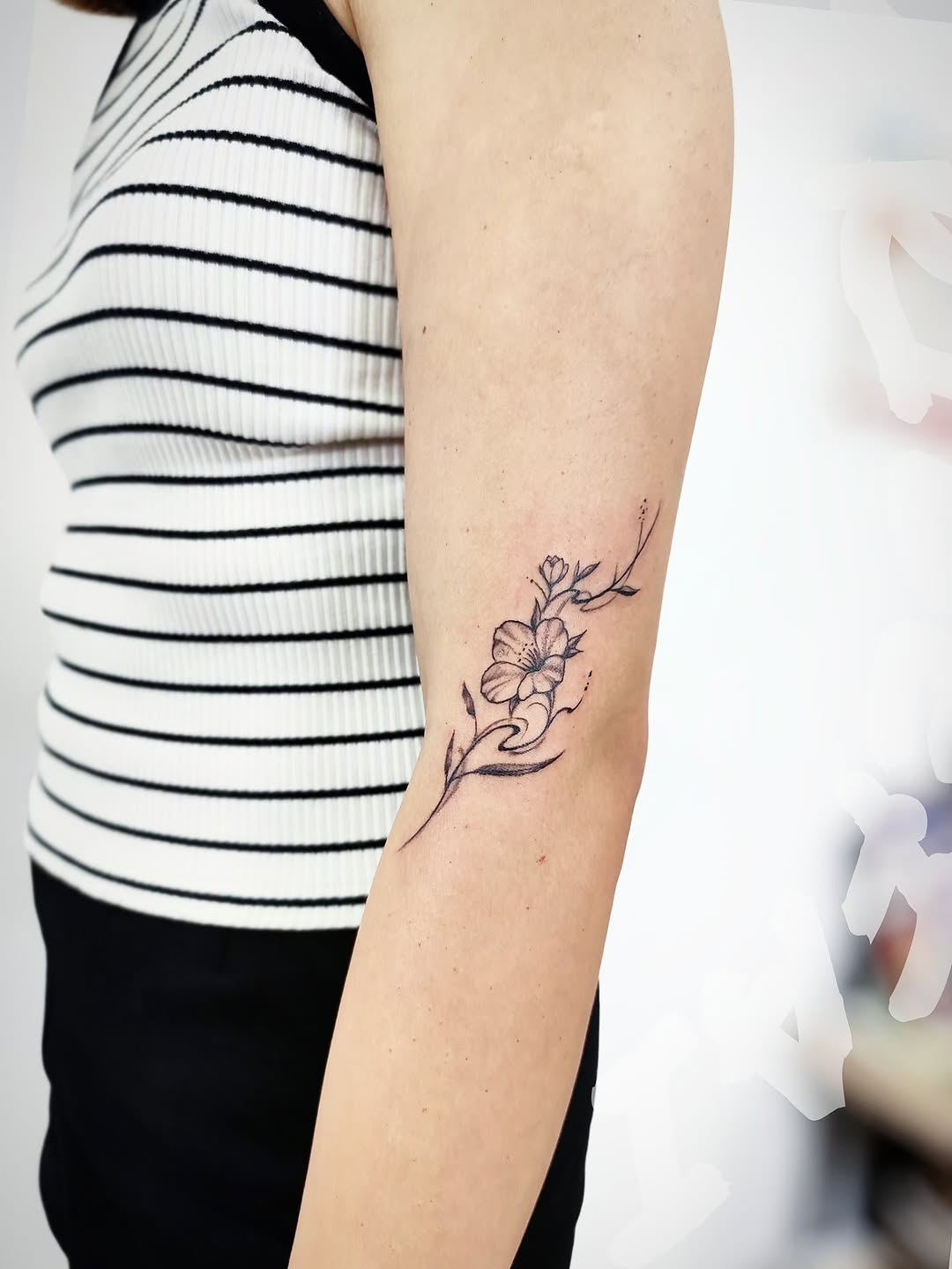 Tattoo by @tribe_tattoo — fine_line, black_and_grey