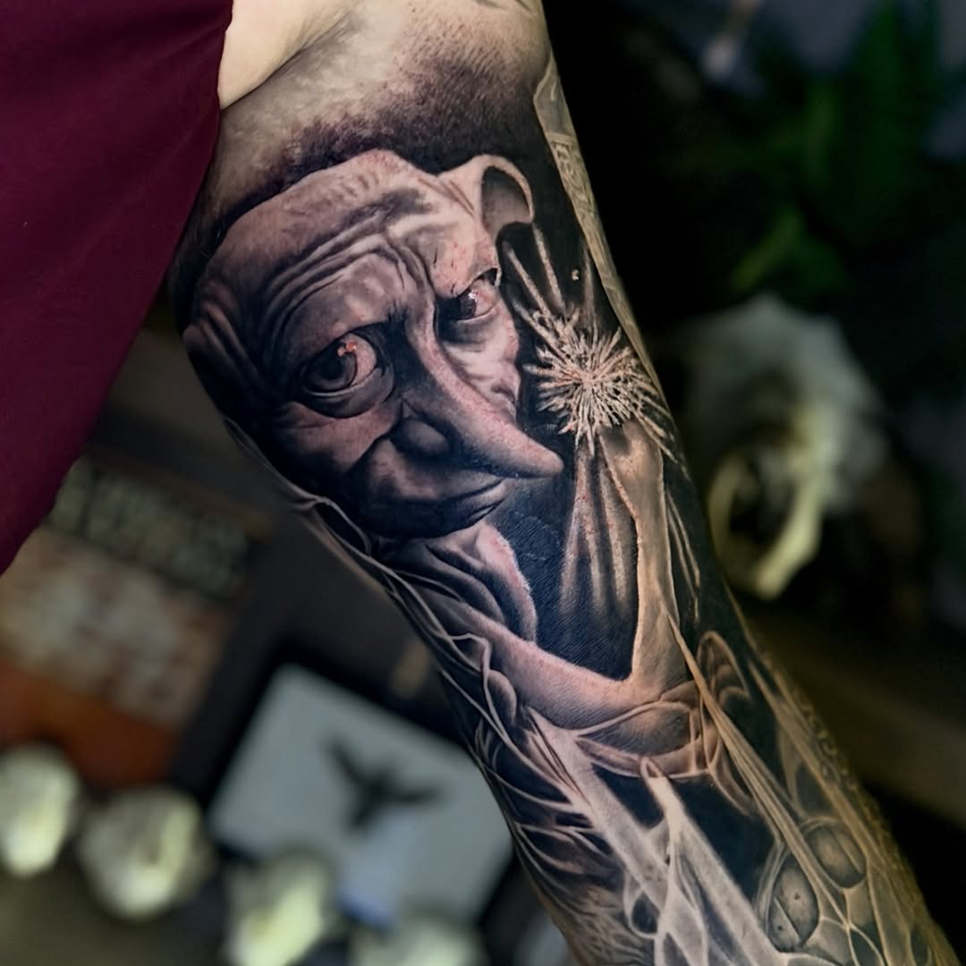 Tattoo by @fleurnoirestudio โ realism, black_and_grey