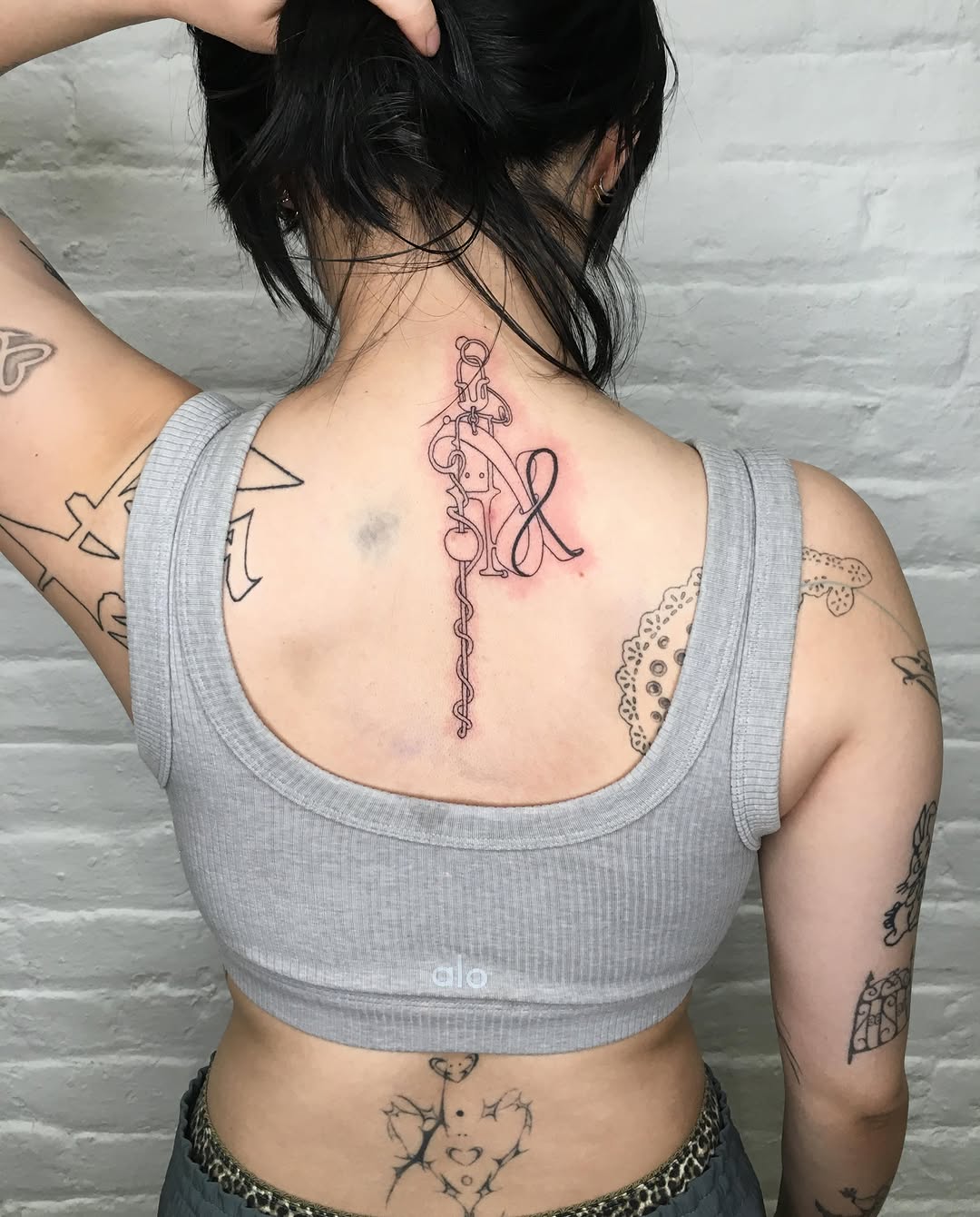 Tattoo by @consomm.able — fine_line, lettering_script
