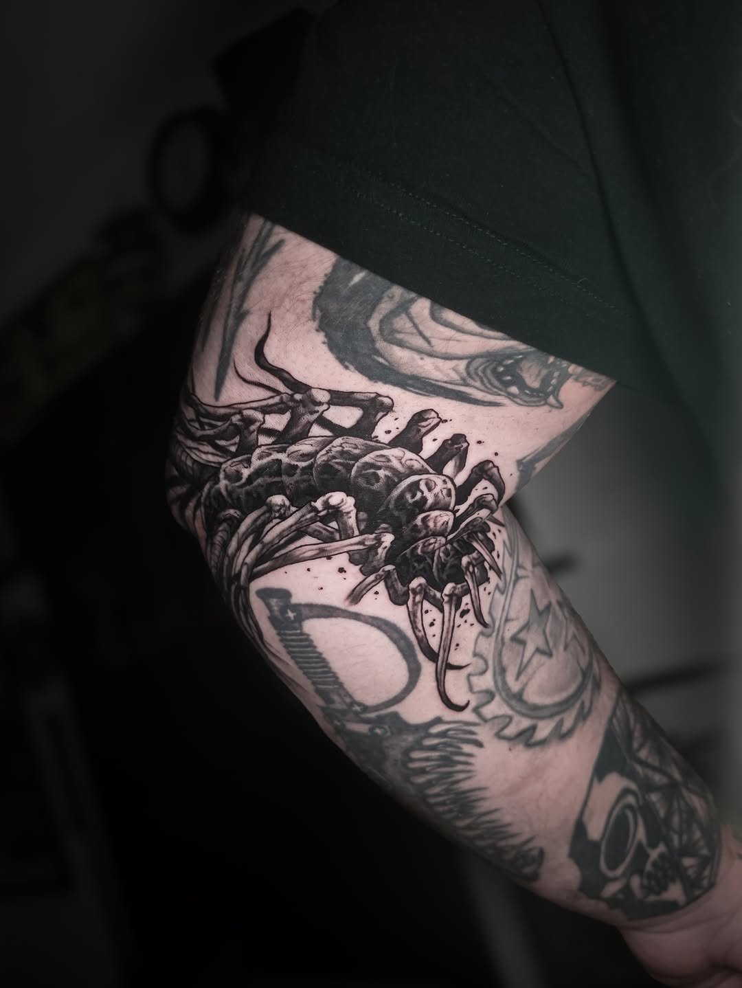Tattoo by @crawlspace_tattoo โ realism, black_and_grey