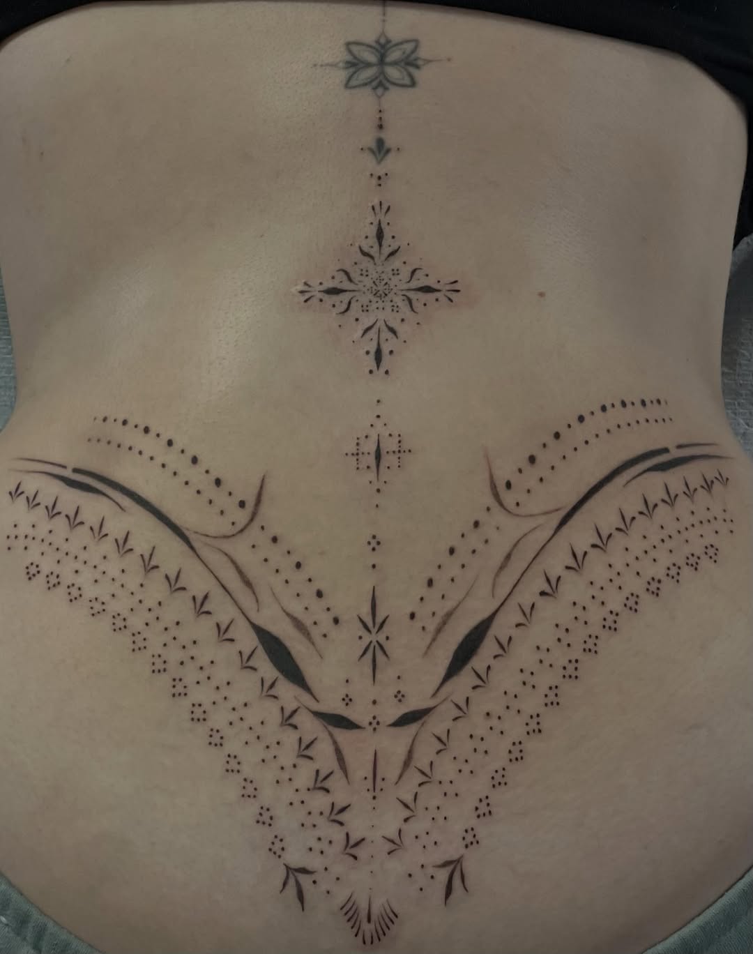 Tattoo by @aleks.north.tattoo — dotwork, ornamental