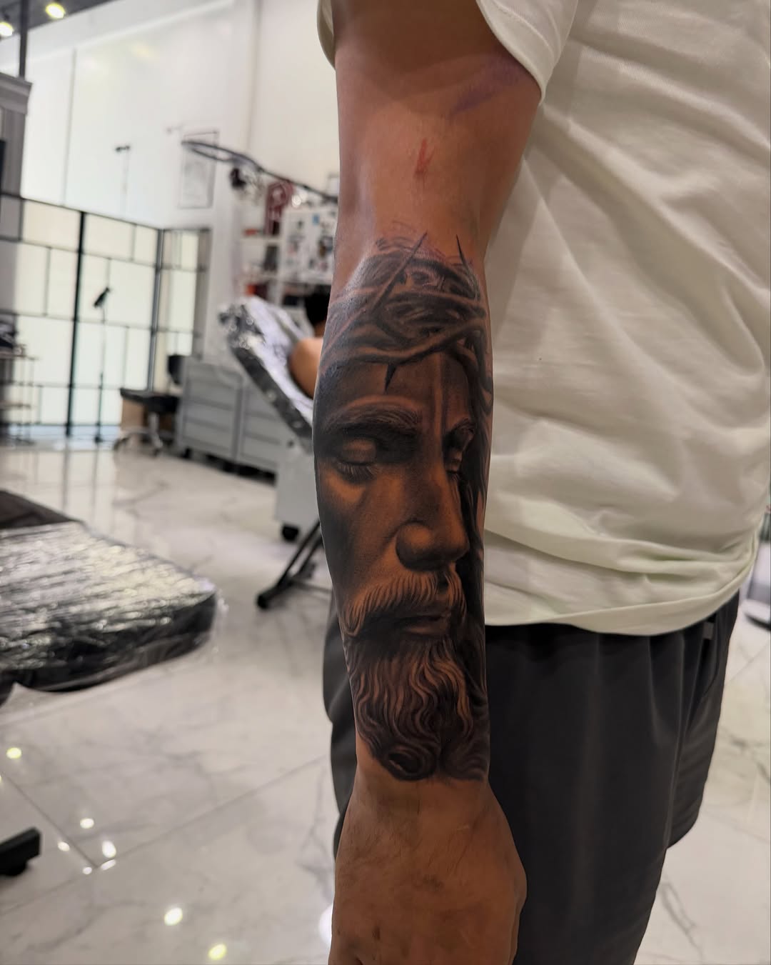 Tattoo by @inkedby.jf โ realism, black_and_grey
