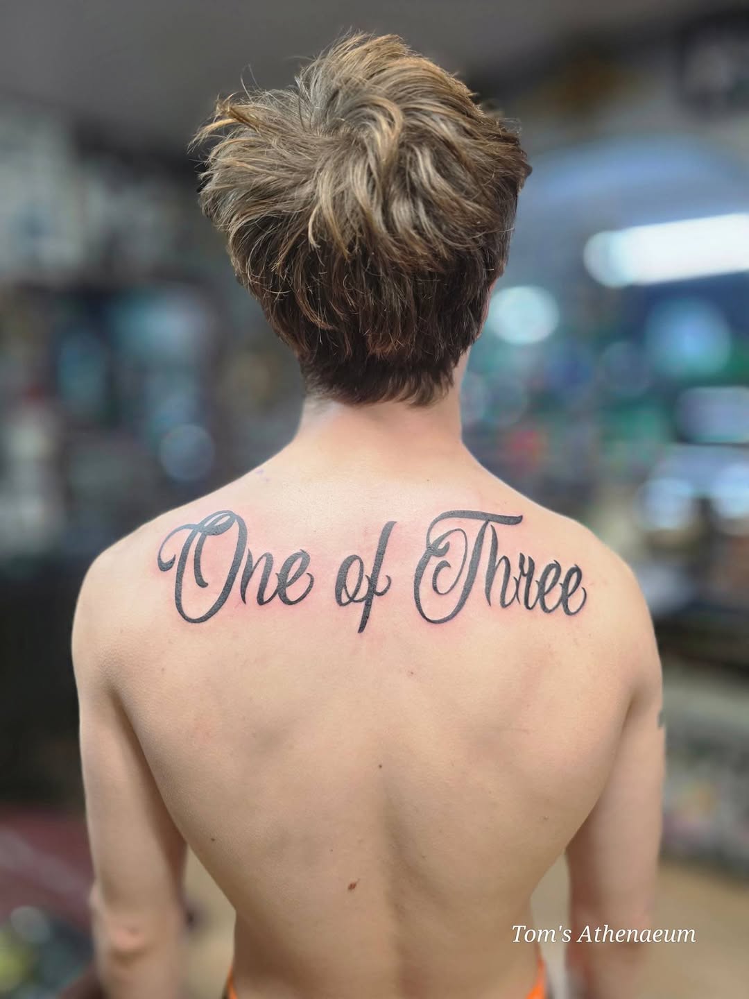 Tattoo by @toms_athenaeum — lettering_script, fine_line