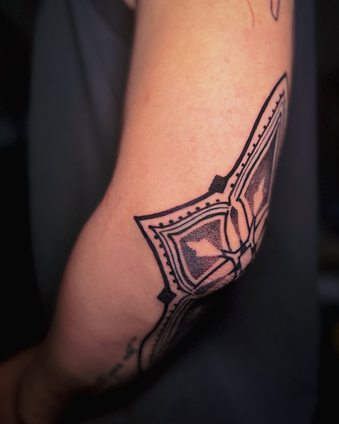 Tattoo by @marytattooing — geometric, dotwork