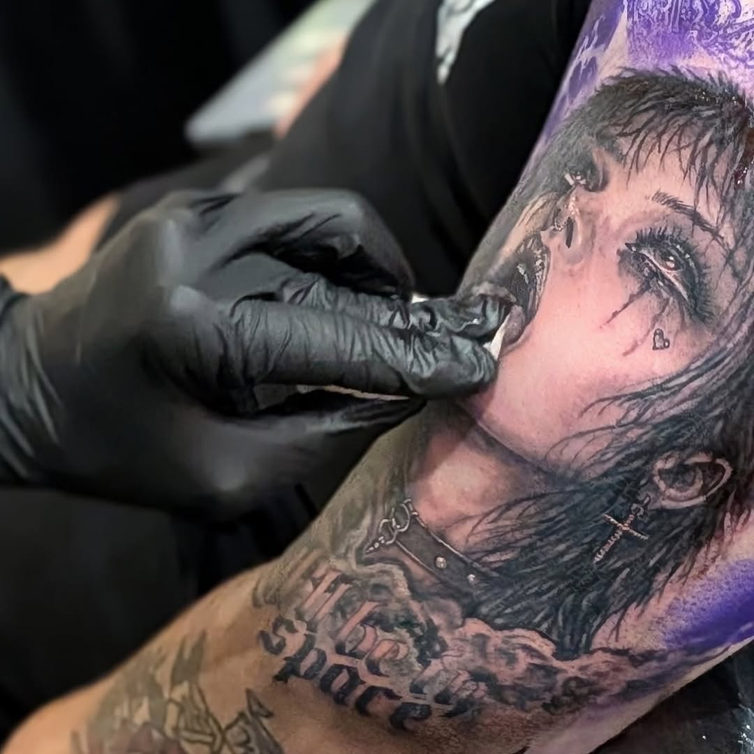 Tattoo by @austin_megallon — realism, black_and_grey