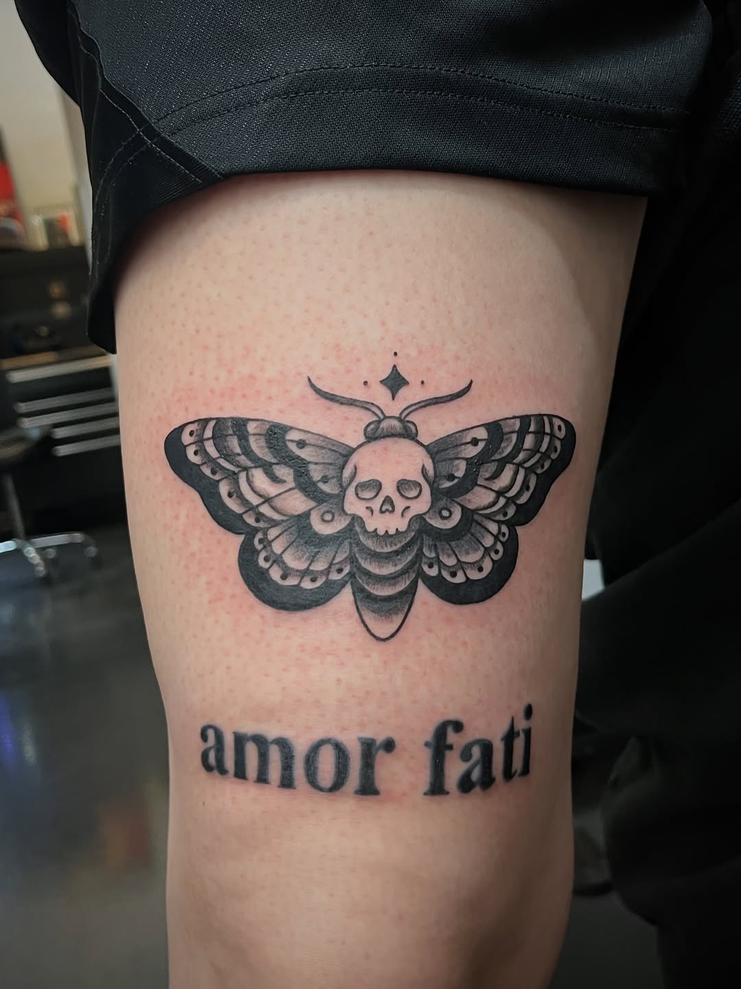 Tattoo by @sailor_riot — black_and_grey, lettering_script