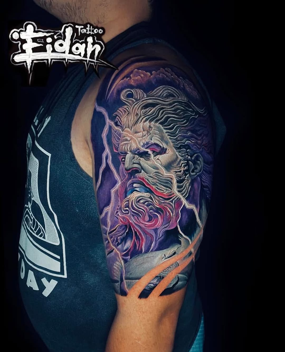 Tattoo by @eidan.tattoo — realism, black_and_grey
