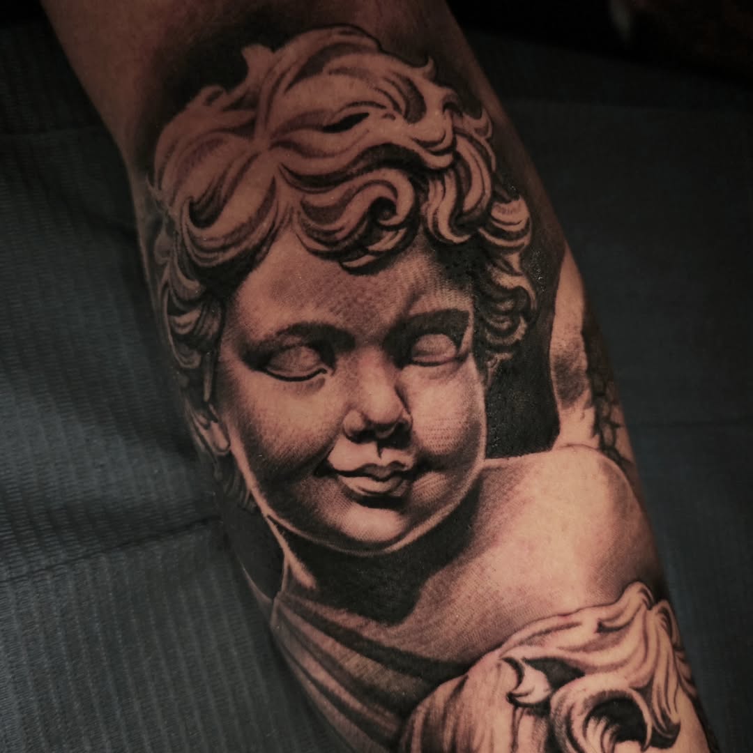 Tattoo by @tattoosmadebysomeone — realism, black_and_grey