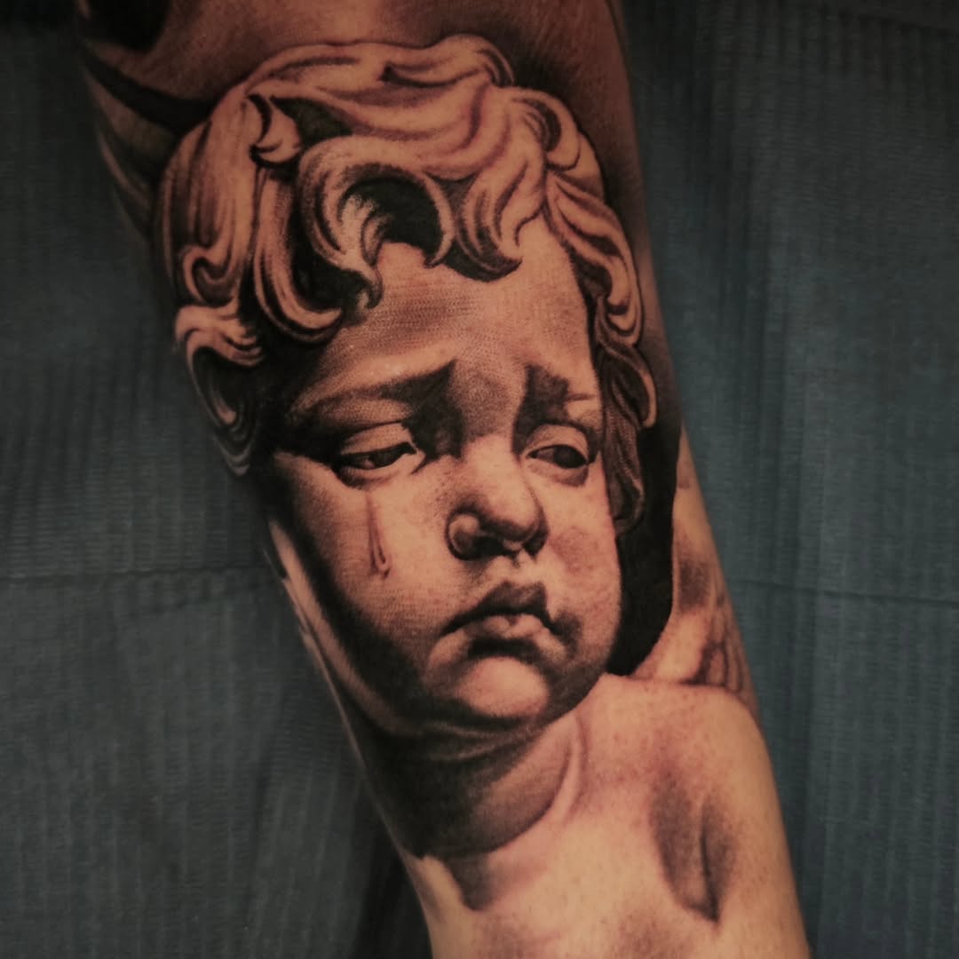 Tattoo by @tattoosmadebysomeone — realism, black_and_grey