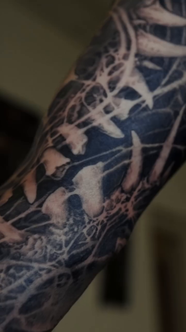 Tattoo by @robbylatos — black_and_grey, dark_realism
